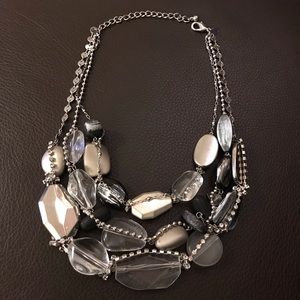 Chico’s stunning silver and crystal tone necklace.
